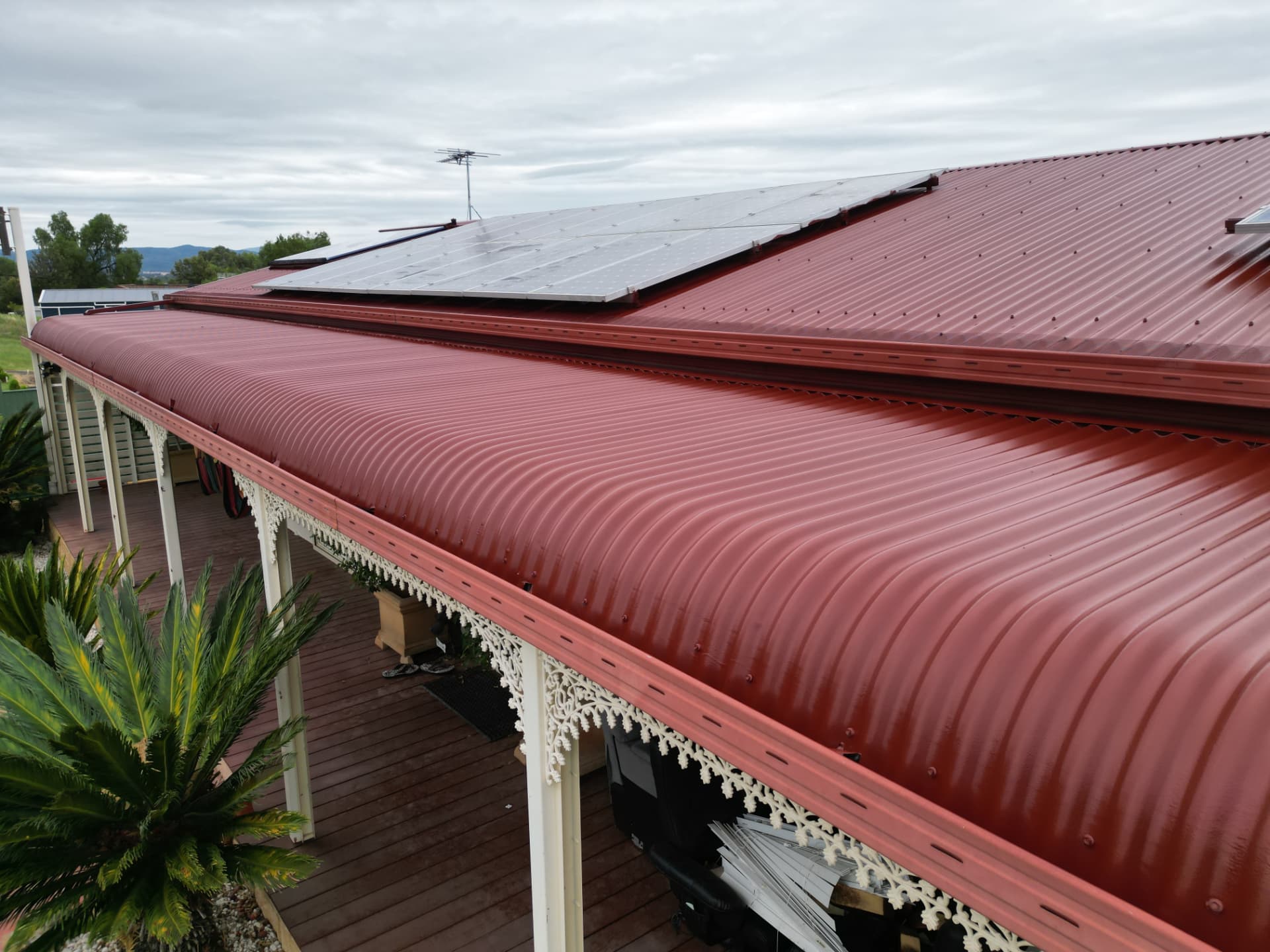 The same Quirindi metal roof after restoration, recoated in manor red over an etch primer