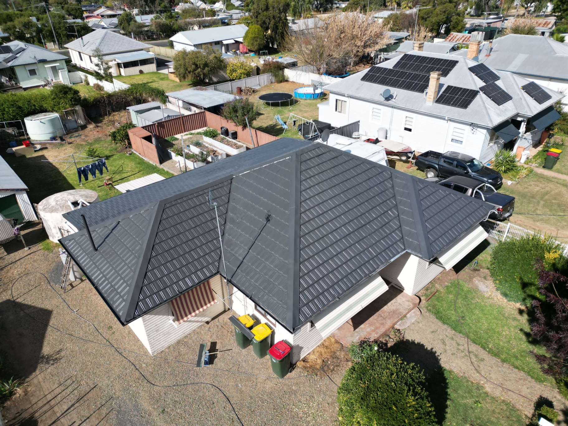 Aerial view of a Quirindi cottage with its tin tile roof fully restored in Monument