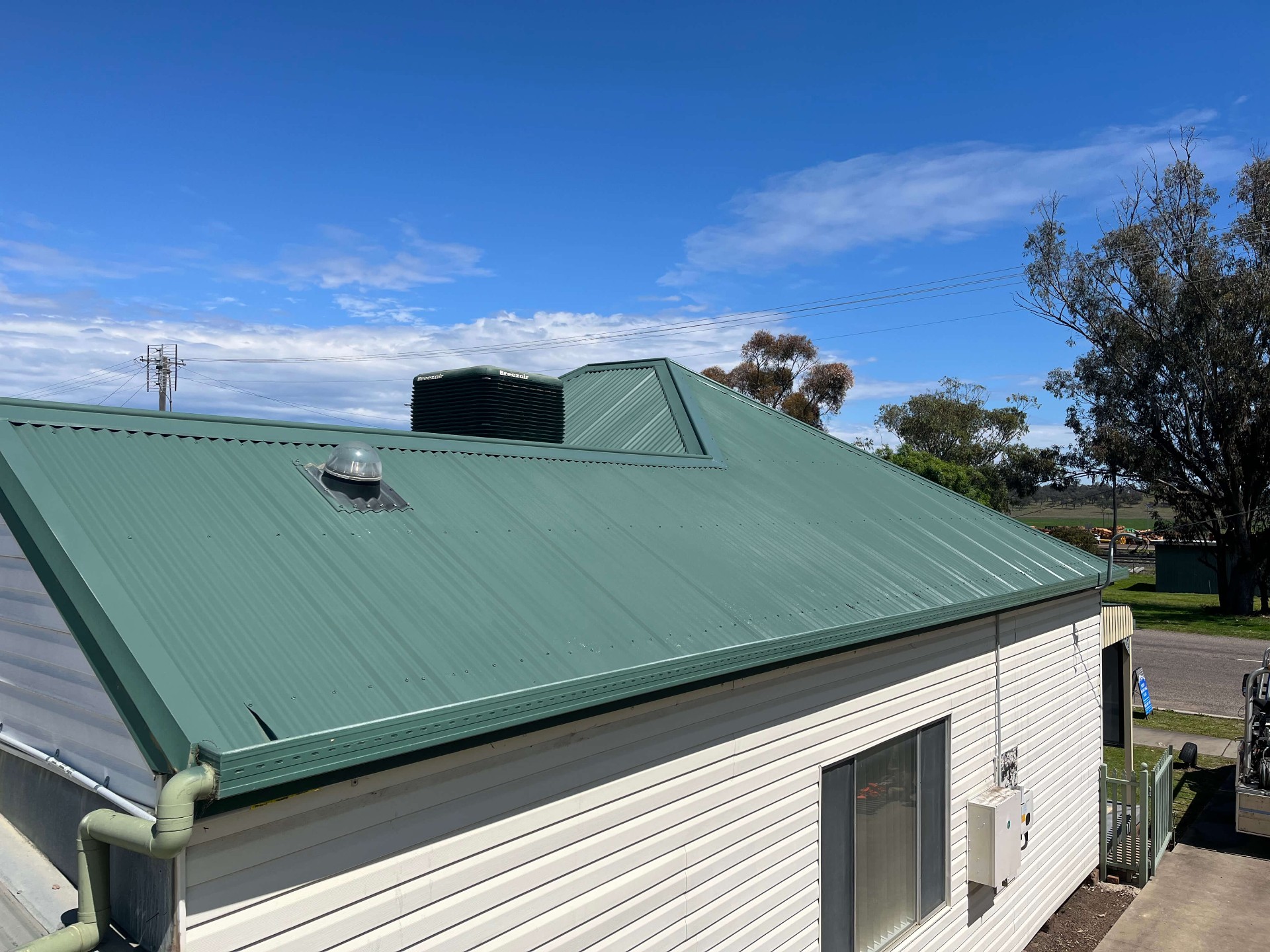 Werris Creek cottage roof freshly recoated in Wilderness green corrugated Colorbond