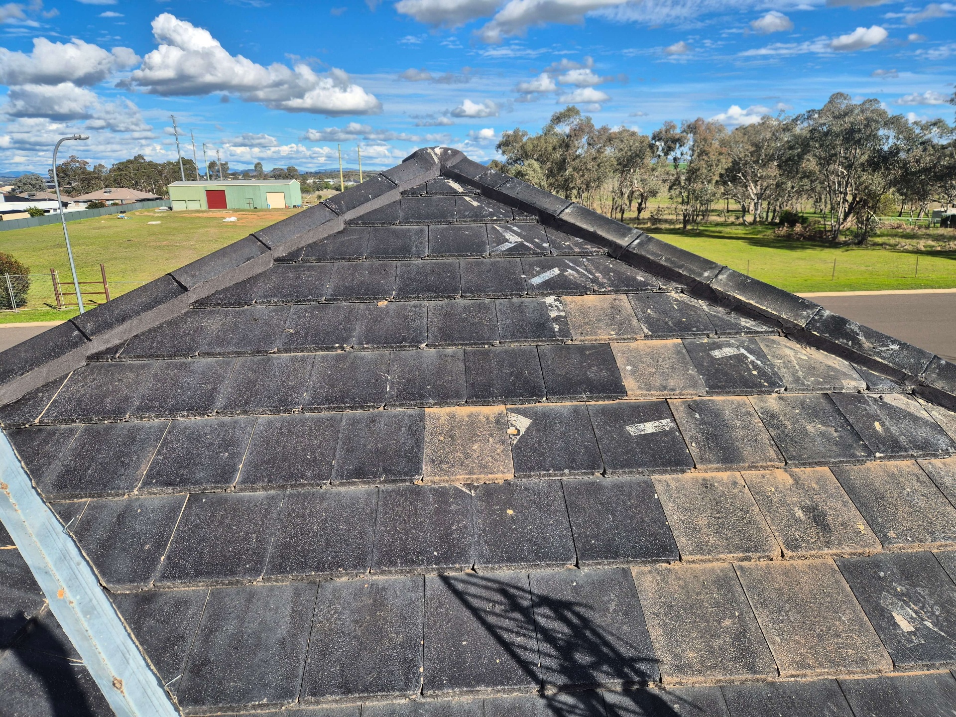 Tile Roof Hip With Broken Tiles Replaced and Ridge Capping Re-Pointed After Storm Damage