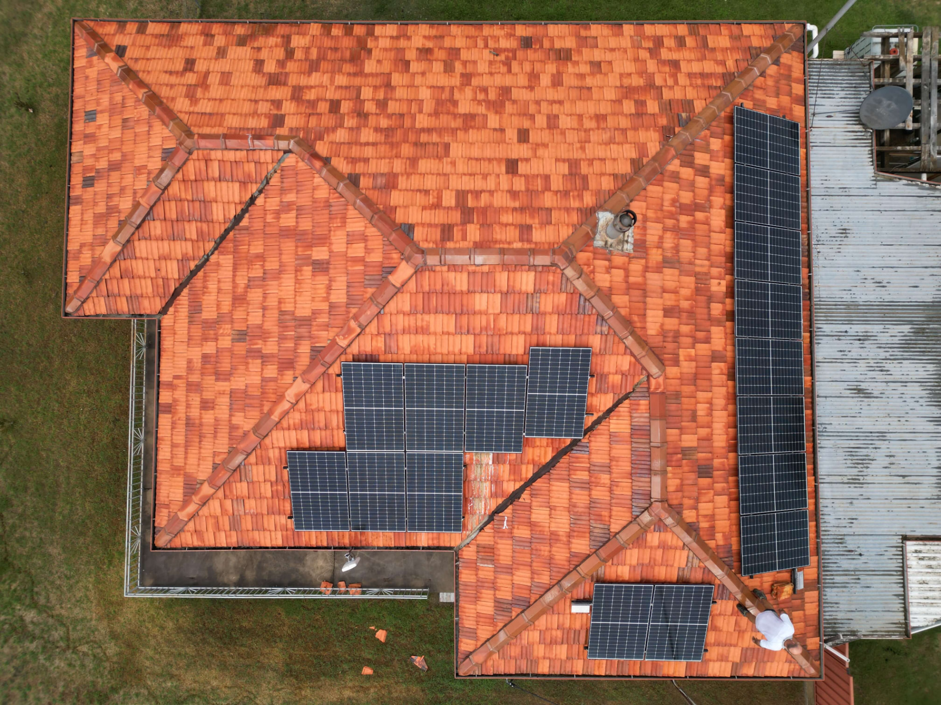 Top-Down Drone Photo of a Quirindi Terracotta Tile Roof After Cleaning, Solar Panels Worked Around