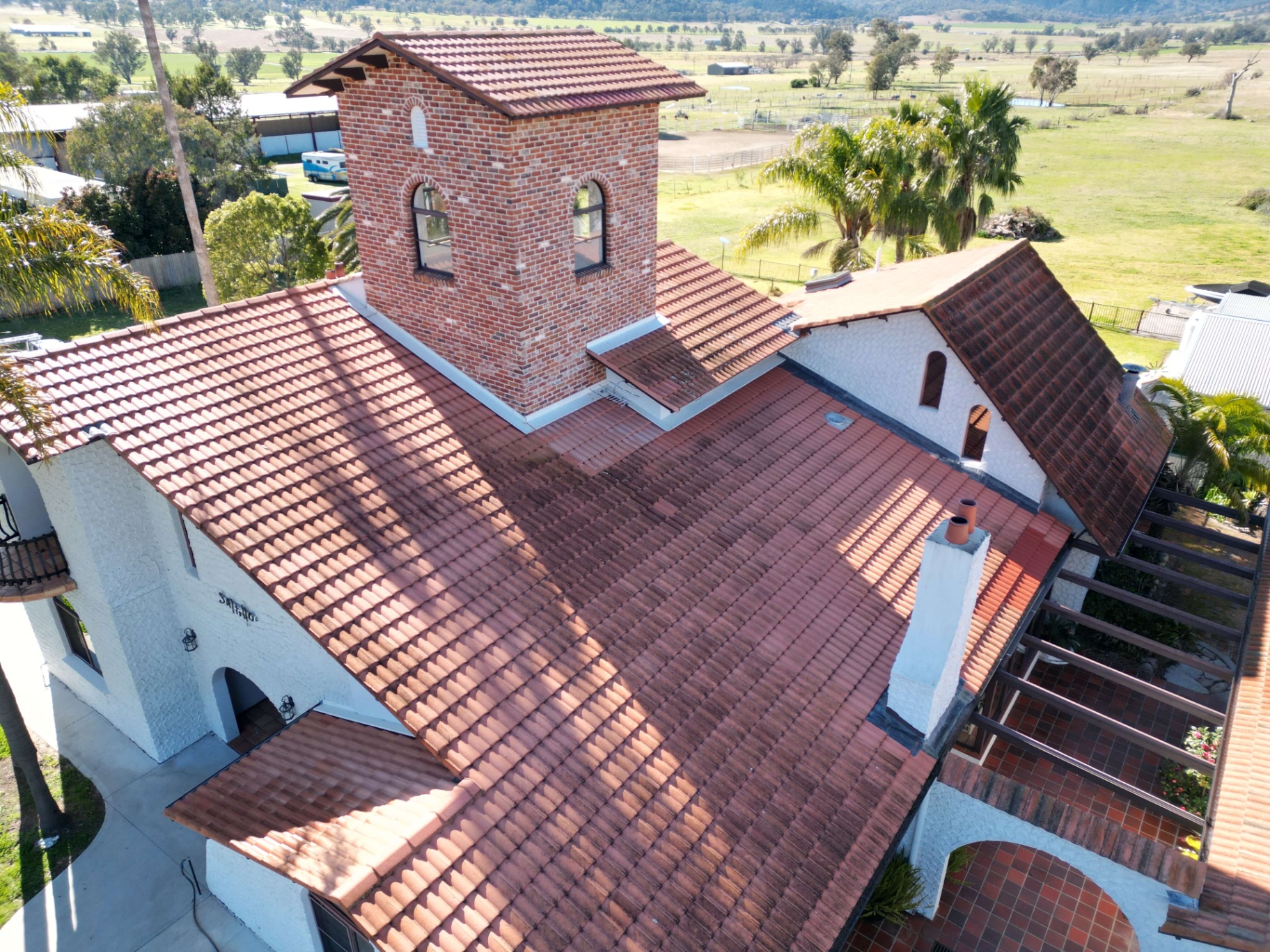 Aerial of a Spanish Mission Homestead With Faded Terracotta Tiles Before Restoration