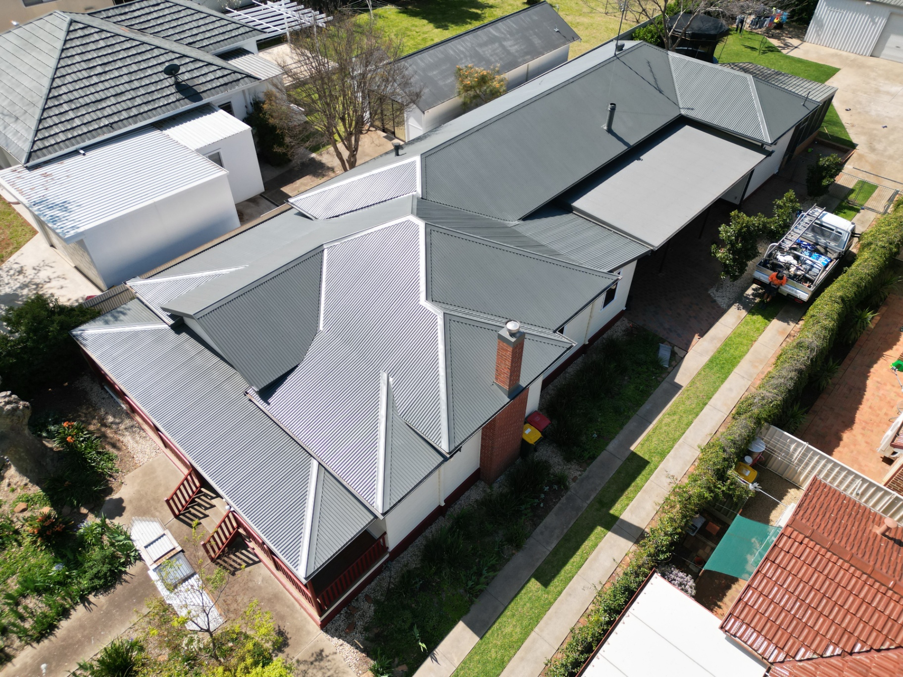 Aerial of a Fully Restored Silver Corrugated Colorbond Roof on a Weatherboard Home