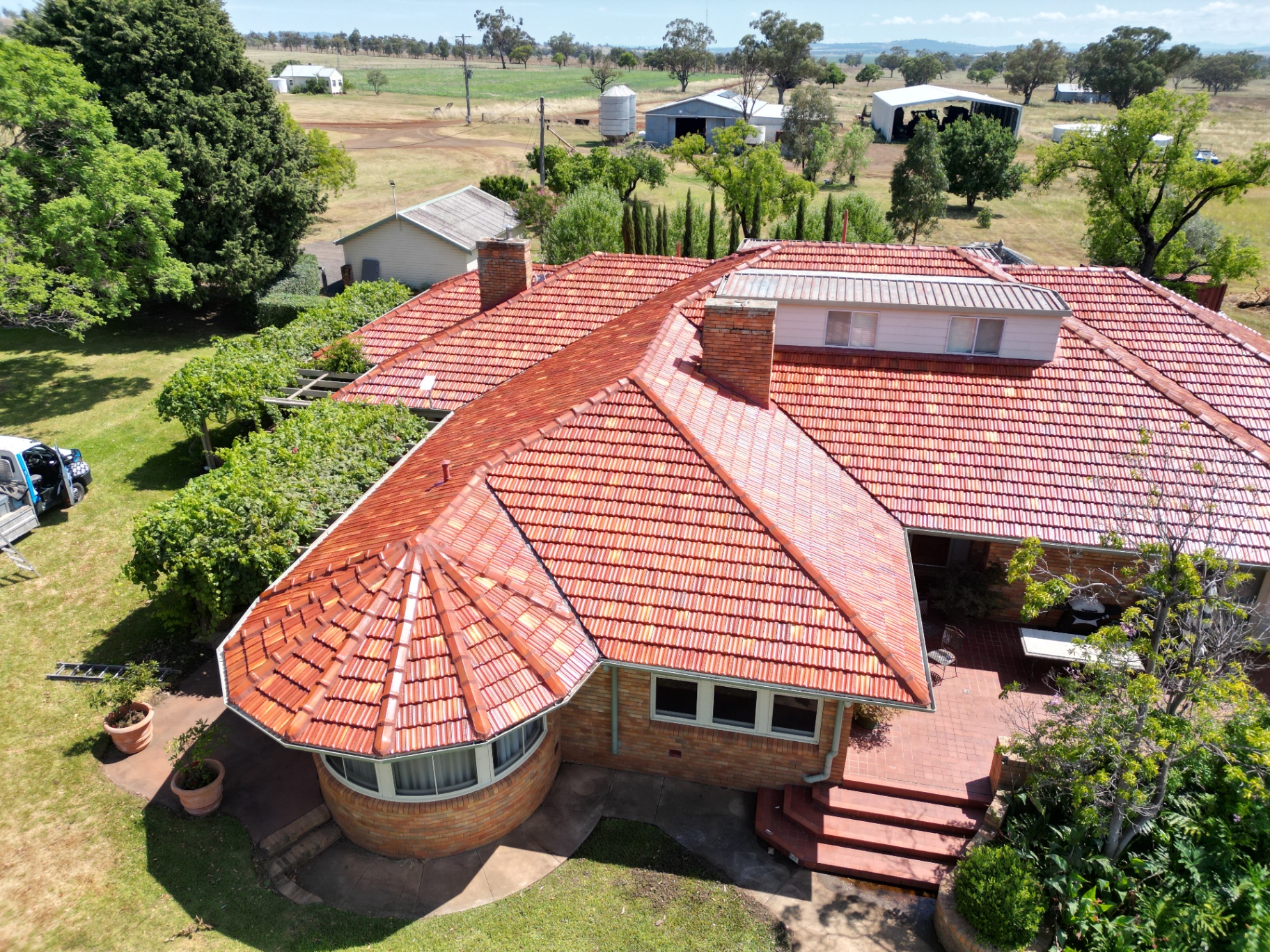 Aerial view of a Werris Creek farmhouse with a cleaned and repointed terracotta tile roof