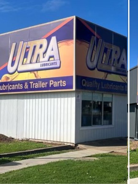 Ultra Lubricants shop front in faded white cladding before airless spray painting