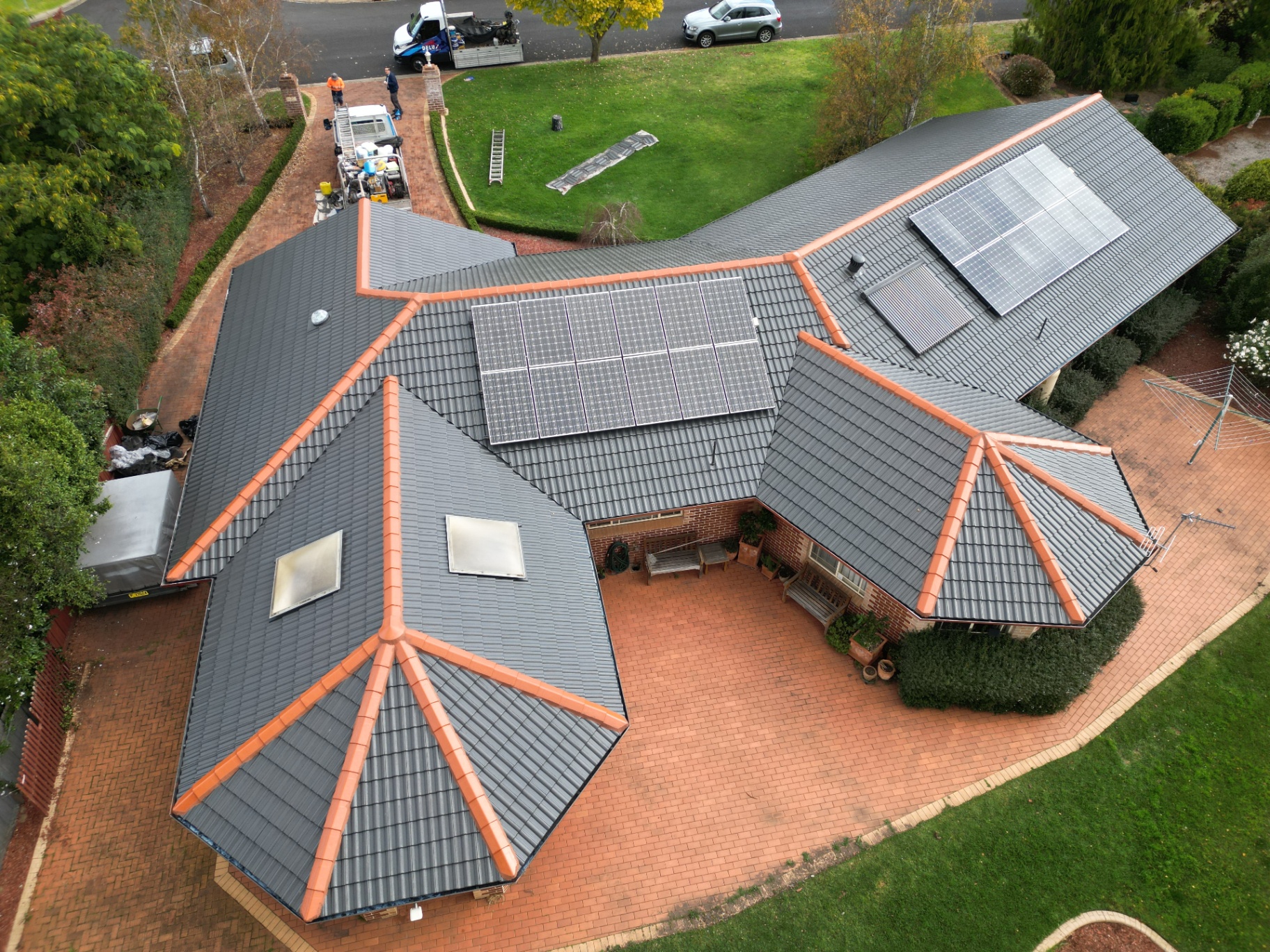 Overhead Drone Photo of a Restored Charcoal Tile Roof With Solar Panels in Armidale