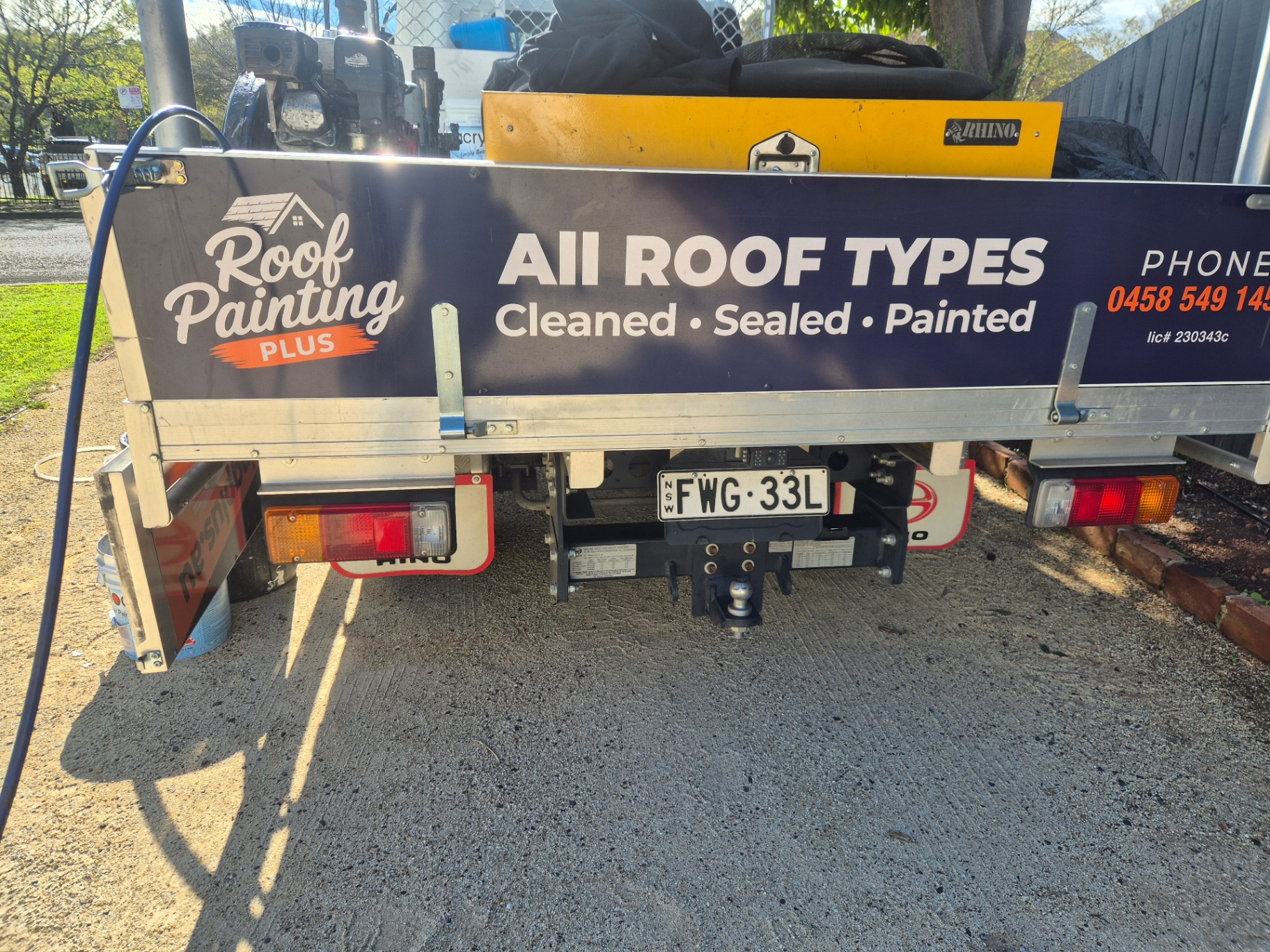 Roof Painting Plus truck signage — all roof types cleaned, sealed and painted